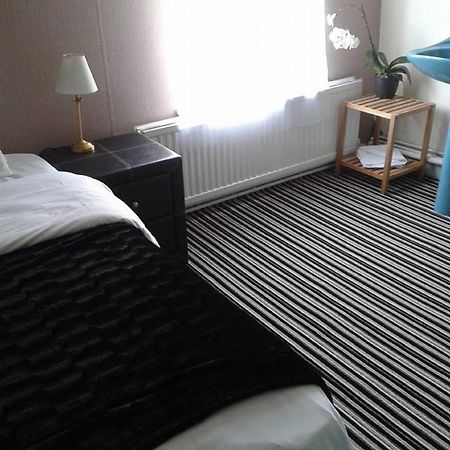 Amber Guesthouse Derby Værelse billede