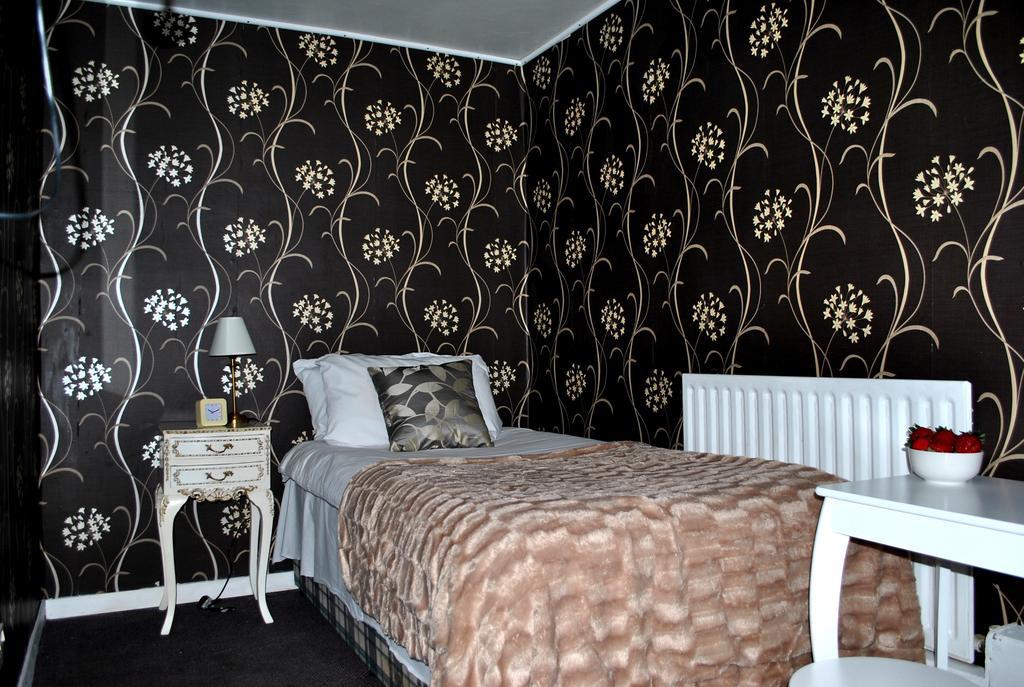 Amber Guesthouse Derby Værelse billede