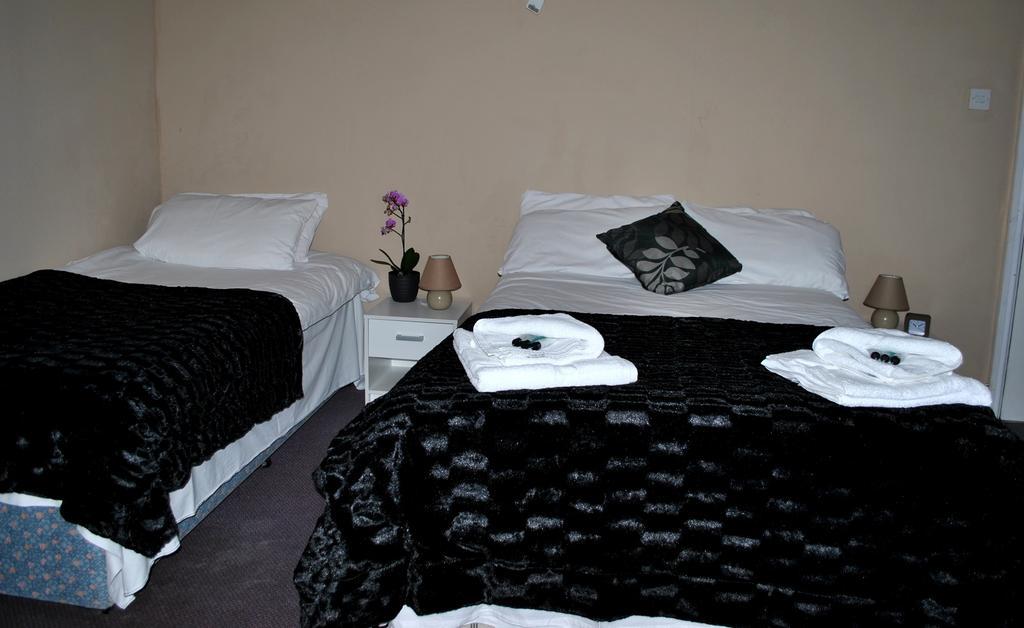 Amber Guesthouse Derby Værelse billede